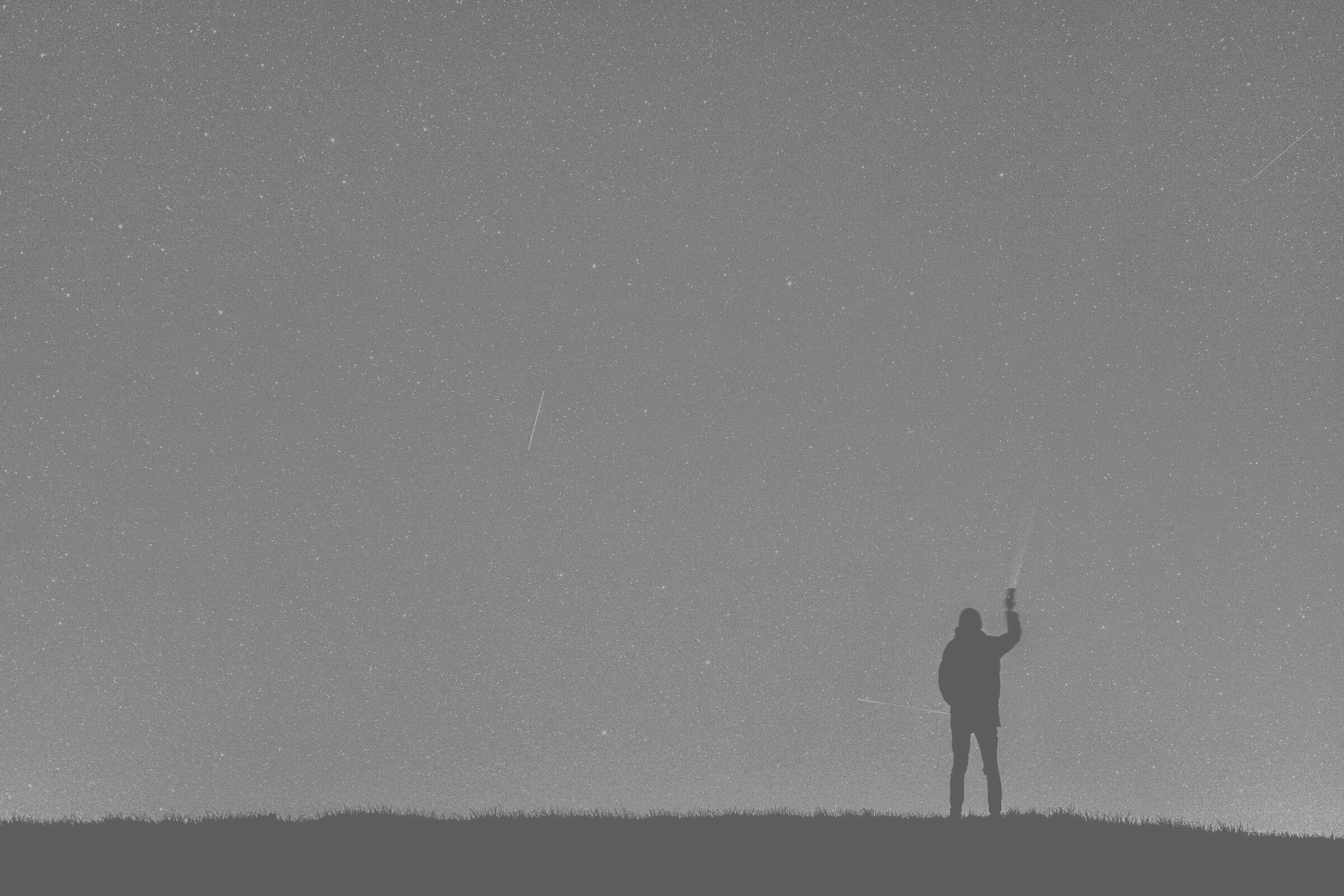 Silhouette Of Man Under Blue Sky During Nighttime